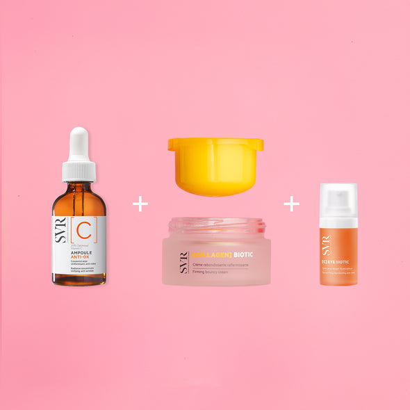 SVR Glow Trio skincare set with Vitamin C serum, collagen bouncy cream, and eye cream on a pink background.